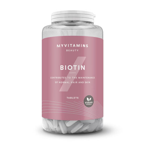 Envase de 90 tabletas de biotina Myvitamins, frasco con etiqueta rosada